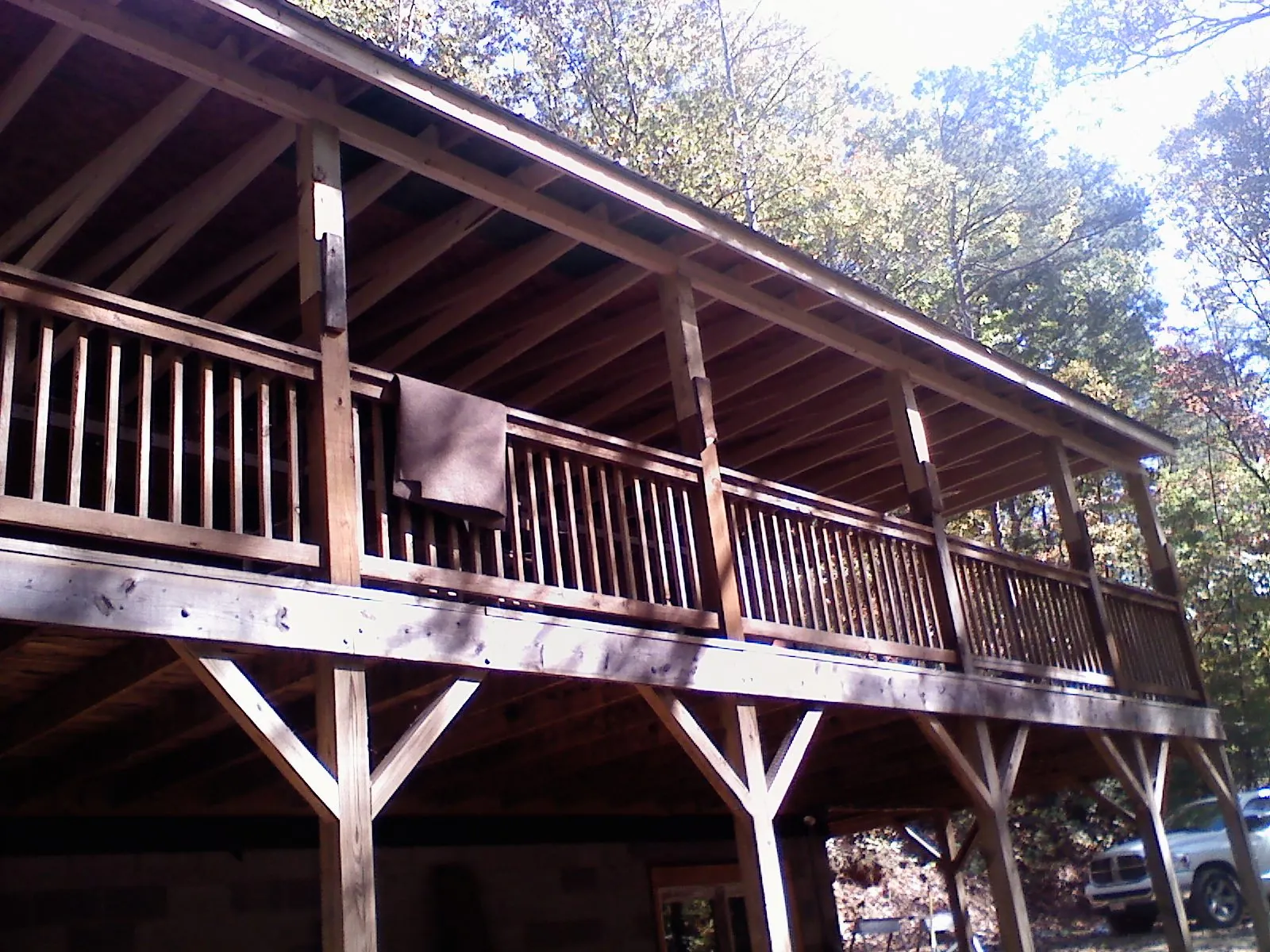 Timber framing under a new elevated porch and deck — Roof Leak Repair in Alexander by Roofing Brothers